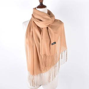 Unisex khaki cashmere scarf with tassels, worn by a mannequin on a white background