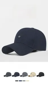 Detail view of cotton twill baseball cap showing SP embroidery logo and color variety