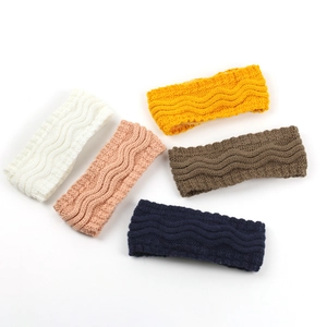 Fleece-lined knit headbands in five colors showing wave textures for winter warmth