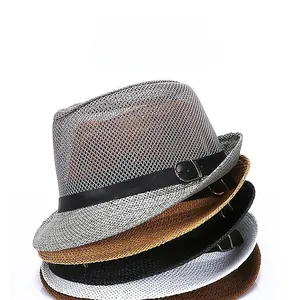 Close-up of mesh weave straw hats in multiple colors with black decorative bands