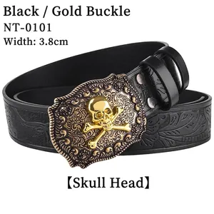 Detailed view of 3.8cm black leather belt featuring floral embossing and gold skull buckle