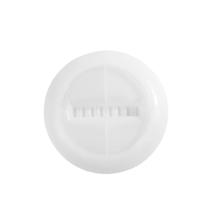 Détail macro d'un moule circulaire blanc en silicone avec renfort croisé et rainures