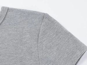 Detailed view of gray modal fabric texture and reinforced shoulder stitching on slim T-shirt