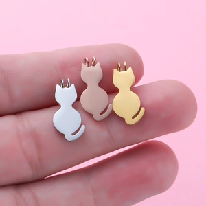 Polished stainless steel cat silhouette pendants in silver, gold, and rose gold finishes