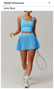 Lake blue two-piece breathable tennis set with square neck crop top and pleated mini skirt