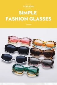 Flat lay of irregular trendy sunglasses in various colors like leopard and matte gradient
