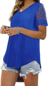 Close-up detail of blue V-neck T-shirt showing delicate lace patchwork sleeve design