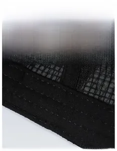 Close-up of breathable mesh fabric and widened sweatband on the black baseball cap