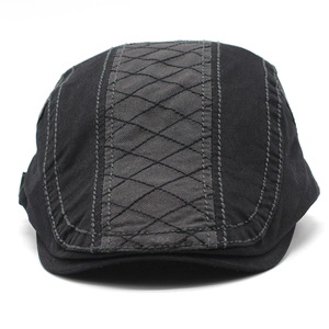 Classic black cotton newsboy cap for men featuring dark grey plaid stitching detail