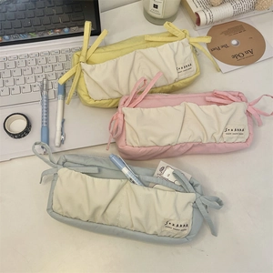 Minimalist canvas pencil case with cute ribbon bow detail in assorted pastel colors