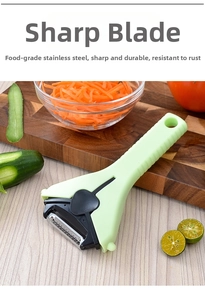 Detail of sharp stainless steel blade on multi-functional 3-in-1 fruit and vegetable peeler