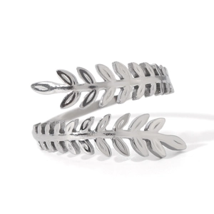 Macro detail of silver adjustable stainless steel ring with elegant leaf wrap pattern