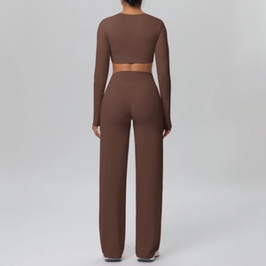 Rear view of brown long sleeve crop top and high waist wide leg yoga pants set