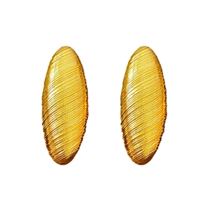Minimalist gold oval earrings with horizontal brushed texture on professional white background