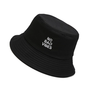 Classic black cotton bucket hat with white NO BAO VIBES embroidery in a 45-degree side view