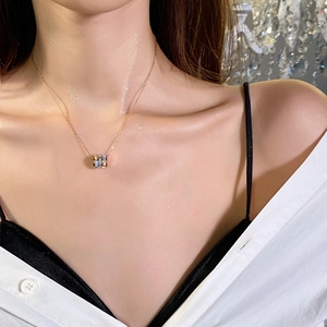 Titanium steel necklace with gold square pendant and colorful stones on model