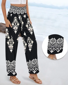 Close-up of Bohemian mandala print on high waist elastic trousers for summer beachwear