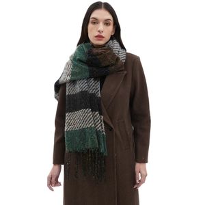 Classic striped tassel scarf in green and brown knit, worn over a stylish autumn coat