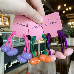 Detail of candy-colored hair ties with smooth double beads and high elasticity rubber bands