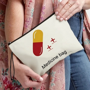 Portable canvas pill storage bag with medicine icon and zipper closure