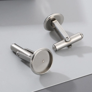Macro shot of silver stainless steel round blank cufflink bases for DIY jewelry