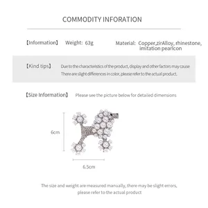 Detailed size chart showing dimensions of the vintage pearl puppy brooch in centimeters