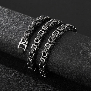 Detailed macro view of vintage Byzantine link chain with secure square plug clasp in steel
