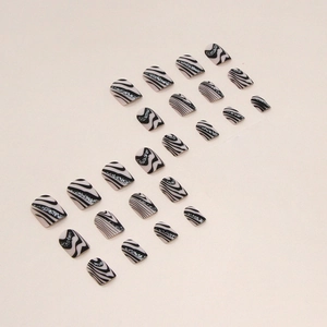 Matte black zebra wave pattern press-on nails with silver glitter accent for women