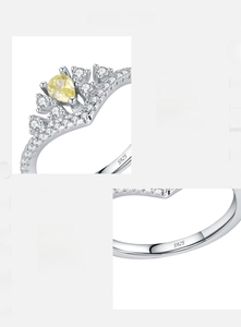 Macro detail of S925 sterling silver crown ring featuring a yellow teardrop zircon
