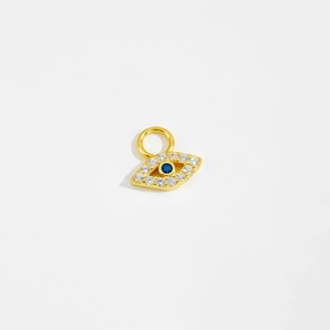 Minimalist S925 silver gold eye pendant with blue and white gems on white background