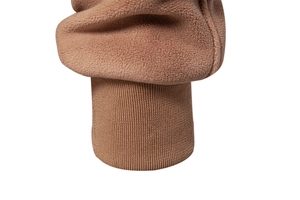 Detailed close-up of brown fleece jacket cuff with ribbed knit elastic wrist band