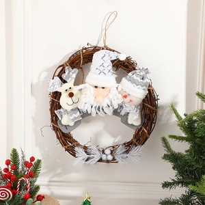 Christmas wreath with Santa, reindeer and snowman plush figures on branch ring