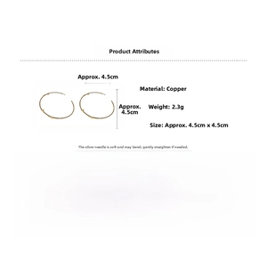 Detailed specs of gold C-shaped hoop earrings with star accents and copper material