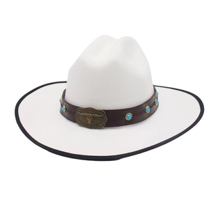 Detail of white fedora with brown leather band, metal bull buckle and turquoise studs