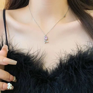 Pink tulip zircon pendant necklace in silver stainless steel on a female model