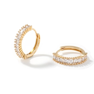 Elegant gold-plated hoop earrings with square zircon stones on a white background