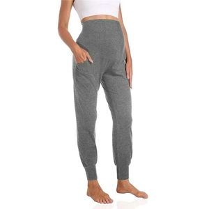 Maternity grey high-waisted jogger pants with supportive belly band and side pockets