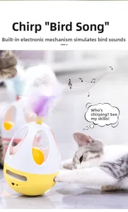 Detail showing interactive tumbler cat toy with purple feathers and electronic bird sound