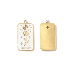 Detailed macro view showing the lovers enamel butterfly pendant with gold dotted texture back