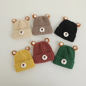 Winter knitted baby hats with bear ears in six colors including beige, yellow and red