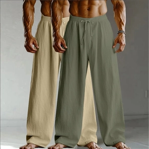 Détail du pantalon large en coton et lin avec taille à cordon en olive et kaki