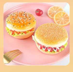 Realistic PU artificial burger models on a pink plate with cherry and lemon decorations