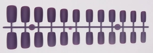Detailed view of matte purple long square press-on nails arranged on a plastic runner