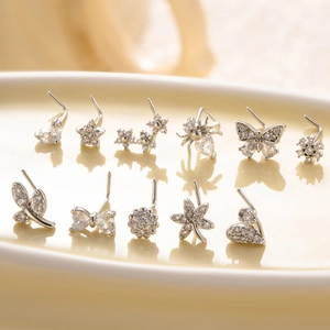 11pcs silver nose stud set with zircon butterfly flower and spider designs on ceramic