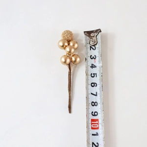 Detailed measurement of a 11.5cm golden artificial berry stem with five smooth berries