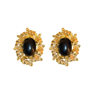 Vintage French style oval black stone earrings with gold leaf-textured frame details