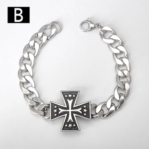 Detail of chunky stainless steel Cuban chain with embossed Maltese cross star pendant