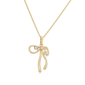 Elegant gold bow necklace featuring pearls and sparkling zircon pendants for women