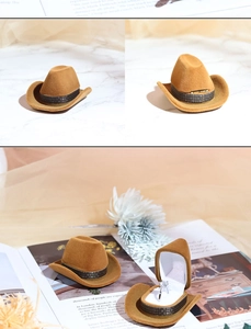 Detail view of creative cowboy hat ring box with soft flocked finish for jewelry storage.