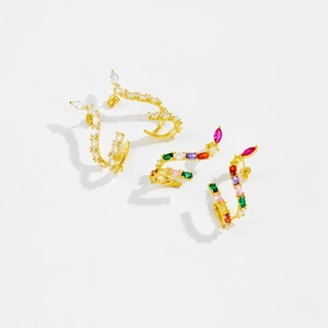 Detailed macro view of S925 sterling silver snake earrings with colorful zircon stones